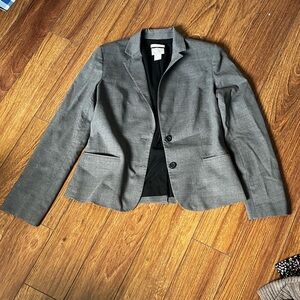 Excellent condition. Made of Italian tropical wool